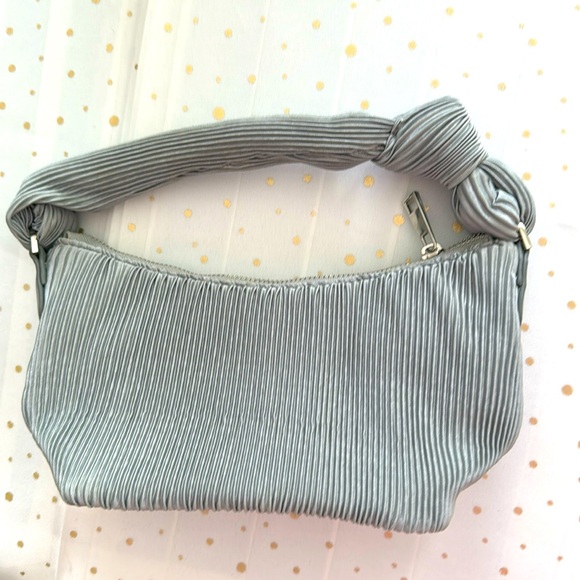 a new day Handbags - A New Day silver gray hand bag with knot on handle and like new